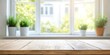 © ThamDesign - A bright, airy interior scene featuring a wooden table in front of a window with potted plants, suggesting a fresh, natural ambiance.