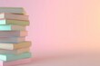 © Elena - Stack of colorful books on pink background, minimalist concept
