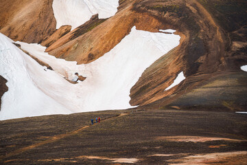 Wall Mural - Volcanic mountain with group of hiker hiking on hill in summer at Iceland