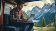 © Anastasia - A young caucasian man with a rugged appearance works on a laptop outside his van, surrounded by majestic mountains and lush greenery