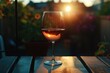 © Alexandr - Glass of wine on wooden table
