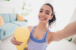 © deagreez - Joyful young woman enjoying indoor workout in modern apartment, showcasing active lifestyle and fitness with a smile, in bright trendy sportswear