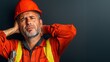 © Nattawootdy - Construction worker with strained neck urban site portrait professional environment focused view health impact awareness