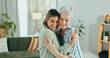 © peopleimages.com - Elderly woman, caregiver and hug with empathy for healthcare, comfort and treatment in senior care at home. People, therapist and embrace for welcome, conversation and support checkup in retirement