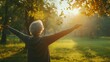 © Sandris Veveris - Senior woman embracing sunlight in nature