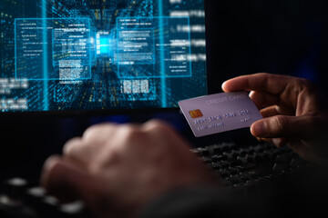 cropped hands image in criminal anonymous male approaching credit card of personal information datab