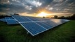 © PBMasterDesign - Solar sustainability idea. Solar panels harnessing sunlight during sunset in a lush green field.