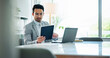 © peopleimages.com - Tablet, research and reading with business man in office for planning, finance and company budget. Networking, communication and client email with person in corporate firm for feedback on sales