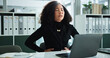 © Clement/peopleimages.com - Accounting, business or finance and woman with indigestion or pain at desk in office for bookkeeping. Menstruation, monthly period and ovulation with accountant in workplace for research or review