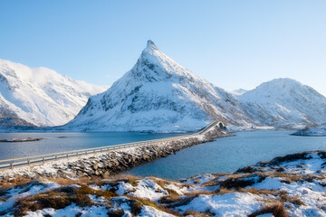 Wall Mural - fredvang bridge, lofoten islands, norway. mountains and road. transportation. winter landscape on th