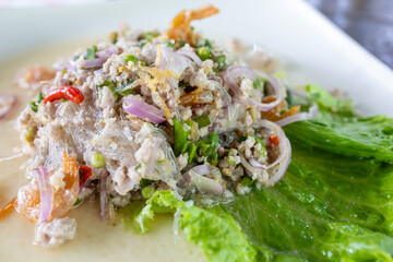 Wall Mural - Top view of Spicy Glass Noodle Salad, focus selective