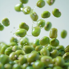 Canvas Print - A close-up of mung beans floating in the air on a white background, flat, without pods.