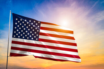 American flag in blue sky and sunshine background 
