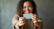 © rodoo - woman holding a credit card