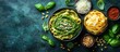 © Almahyra - Delicious spinach pesto pasta with pine nuts and parmesan cheese.