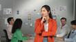 © Summit Art Creations - Asian professional businesswoman standing with confident at creative business meeting. Confident leader posing while diverse business people discussion about using Ux and Ui design. Manipulator.