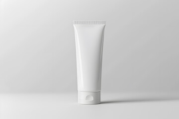 Minimalist blank tube mockup with smooth surface and distinct cap on white background