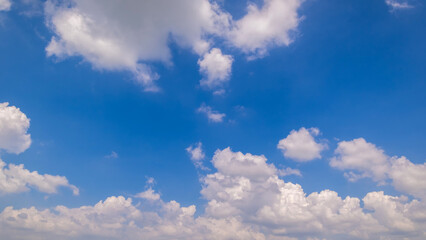 Wall Mural - clear blue sky background,clouds with background, blue sky background with tiny clouds. white fluffy
