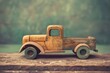 © VolumeThings - Old toy truck on aquamarine background vintage instagram photo