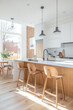 © VERTEX SPACE - A bright and modern kitchen featuring wooden bar stools, sleek countertops, and large windows that invite natural light. minimalist design creates warm and inviting atmosphere