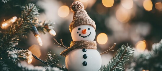 Aufkleber - Christmas snowman ornament with fir tree branches and blurred lights background festive winter decoration concept