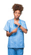 © Krakenimages.com - Young african american doctor woman over isolated background In hurry pointing to watch time, impatience, upset and angry for deadline delay