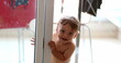 © Marco - Cute baby toddler peeking out, adorable infant wearing diapers