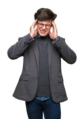 Wall Mural - Young handsome business man wearing glasses over isolated background suffering from headache desperate and stressed because pain and migraine. Hands on head.