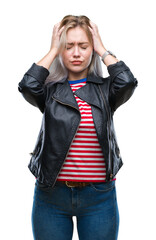 Wall Mural - Young blonde woman wearing black jacket over isolated background suffering from headache desperate and stressed because pain and migraine. Hands on head.