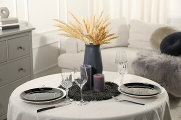 Wall Mural - Stylish table setting with black dishware in dining room