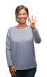 © Krakenimages.com - Middle age senior hispanic woman over isolated background showing and pointing up with fingers number four while smiling confident and happy.