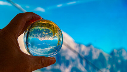 Wall Mural - Crystal ball alpine landscape shot on a sunny summer day at Mount Asitz, Leogang, Zell am See, Pinzgau, Salzburg, Austria