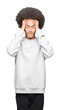 © Krakenimages.com - Young african american man with afro hair wearing sporty sweatshirt with hand on head for pain in head because stress. Suffering migraine.