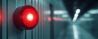 © Suritong - A close-up of a red indicator light in a futuristic corridor, showcasing modern design.