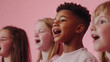 © sabyna75 - Joyful group of older children singing in choir practice on vibrant pink background