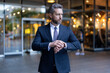 © be free - Business deadline. Businessman late for business deadline. Time management. Punctual man check time on watch being late. Businessman with watch. Punctual businessman checking time outside
