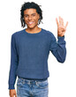 © Krakenimages.com - Young african american man wearing casual winter sweater showing and pointing up with fingers number four while smiling confident and happy.