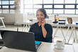 © peopleimages.com - Smile, call center and laptop with business woman in office for communication, contact us and sales agent. Telemarketing, crm advisory and help desk with person in agency for consulting and hotline