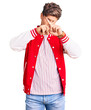 © Krakenimages.com - Young handsome man wearing baseball uniform rejection expression crossing fingers doing negative sign