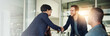 © peopleimages.com - Business, people and handshake in office with partnership in investment project, funding proposal success and deal. Financial investor, collaboration and shaking hands for congratulations with banner