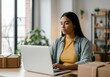 © Running opossum - Small business owner processing orders on a laptop, surrounded by packages, demonstrating the growth of e-commerce