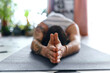 © peopleimages.com - Hands, person and yoga of meditation at house for holistic fitness, spiritual healing and mindfulness. Active, man and pilates with exercise for mental health, calm performance and self care routine