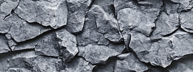 Wall Mural - Gray grunge banner. Abstract stone background. The texture of the stone wall. Close-up. Light gray rock backdrop.