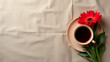 © fotoluigi868 - A simple yet elegant flat lay design features a coffee cup with a red flower on a rustic sackcloth background, evoking feminine concepts._00002_