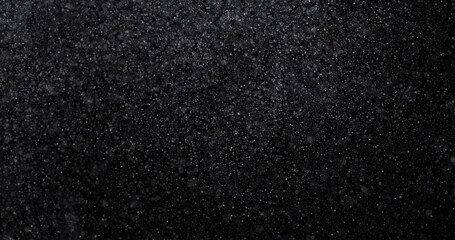 Wall Mural - Natural white winter snowfall on a black background 3d rendering