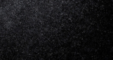 Wall Mural - Natural white winter snowfall on a black background 3d rendering