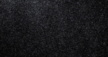 Wall Mural - Natural white winter snowfall on a black background 3d rendering