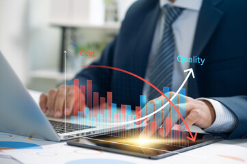 Fototapete - analysis of cost vs quality trends concept. A businessman working on a laptop with a digital graph displaying cost reduction and quality improvement, symbolizing strategic planning.