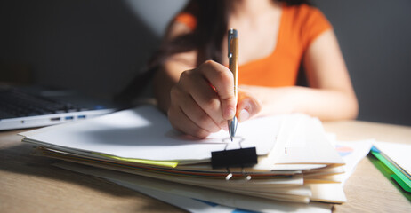 Poster - woman writing on a papers