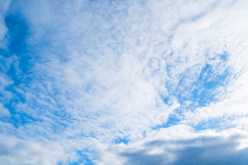 Wall Mural - blue cloudy sky landscape, sweeping blue sky background with with clouds